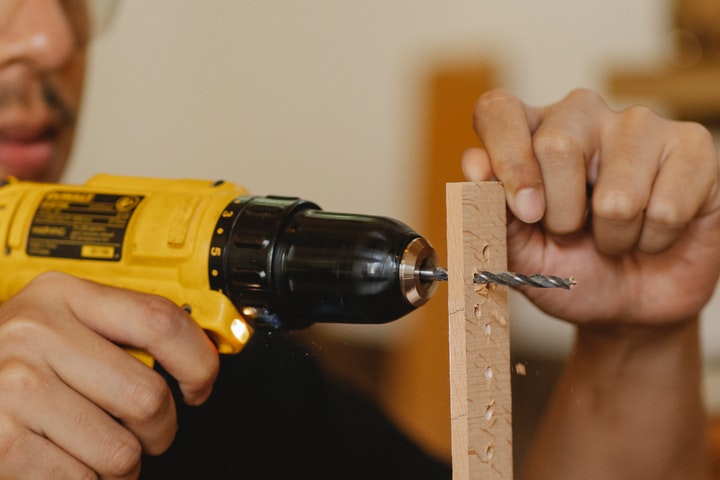 man-working-on-sycamore-wood
